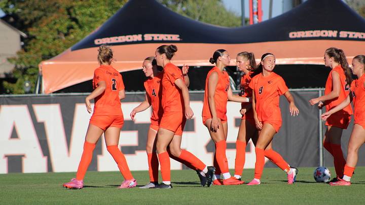 The Oregon State Women's Soccer Team walking together on Paul Lorenz Field. The Oregon State Women's Soccer Team walking together on Paul Lorenz Field.