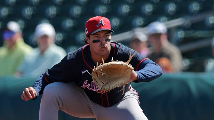 Feb 28, 2025; Jupiter, Florida, USA; Atlanta Braves first baseman David McCabe (72) makes a catch and retires Miami Marlins right fielder Jesus Sanchez (not picutred) during the first inning at Roger Dean Chevrolet Stadium. Mandatory Credit: Sam Navarro-Imagn Images