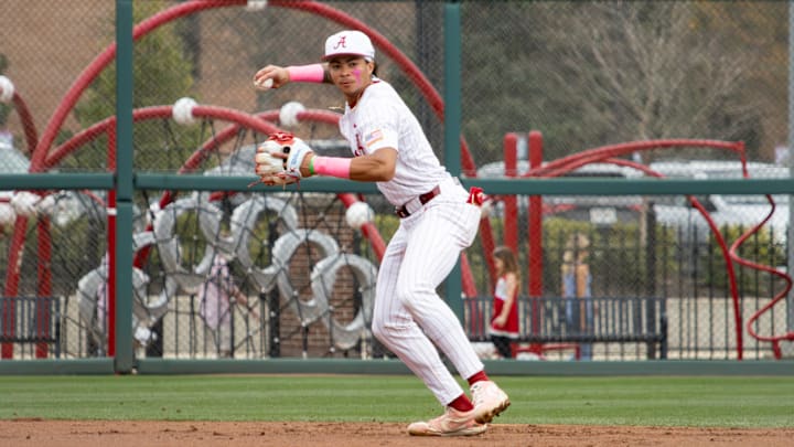 Alabama infielder Justin Lebron throws the ball for an out in the second game of the series against Rhode Island on Feb. 21, 2026. Alabama infielder Justin Lebron throws the ball for an out in the second game of the series against Rhode Island on Feb. 21, 2026.