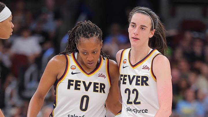 Kelsey Mitchell and Caitlin Clark walk off the court during an Indiana Fever game. Kelsey Mitchell and Caitlin Clark walk off the court during an Indiana Fever game.