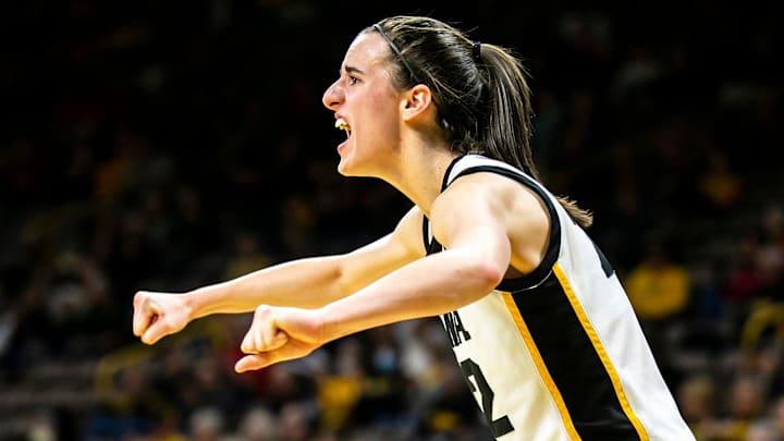 Iowa guard Caitlin Clark cheers on teammates during a NCAA Big Ten Conference women's basketball game against Northwestern, Wednesday, Jan. 11, 2023, at Carver-Hawkeye Arena in Iowa City, Iowa. Iowa guard Caitlin Clark cheers on teammates during a NCAA Big Ten Conference women's basketball game against Northwestern, Wednesday, Jan. 11, 2023, at Carver-Hawkeye Arena in Iowa City, Iowa.