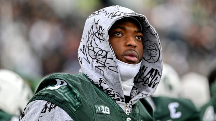 Michigan State's Jalen Thompson dressed in street clothes looks on from the sideline during the first quarter in the game against UCLA on Saturday, Oct. 11, 2025, at Spartan Stadium in East Lansing.