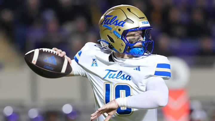 Oct 16, 2025; Greenville, North Carolina, USA;  Tulsa Golden Hurricane quarterback Baylor Hayes (10) throws the ball against the East Carolina Pirates during the first half at Dowdy-Ficklen Stadium. Mandatory Credit: James Guillory-Imagn Images