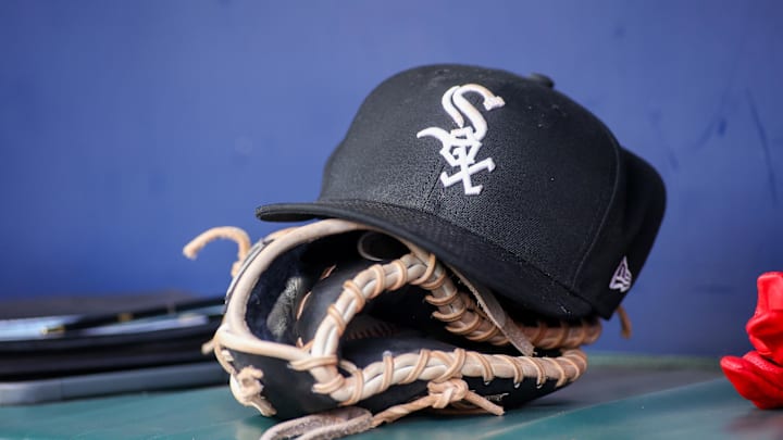 Jul 15, 2023; Atlanta, Georgia, USA; A detailed view of a Chicago White Sox hat and glove in the dugout against the Atlanta Braves in the first inning at Truist Park. Mandatory Credit: Brett Davis-Imagn Images Jul 15, 2023; Atlanta, Georgia, USA; A detailed view of a Chicago White Sox hat and glove in the dugout against the Atlanta Braves in the first inning at Truist Park. Mandatory Credit: Brett Davis-Imagn Images