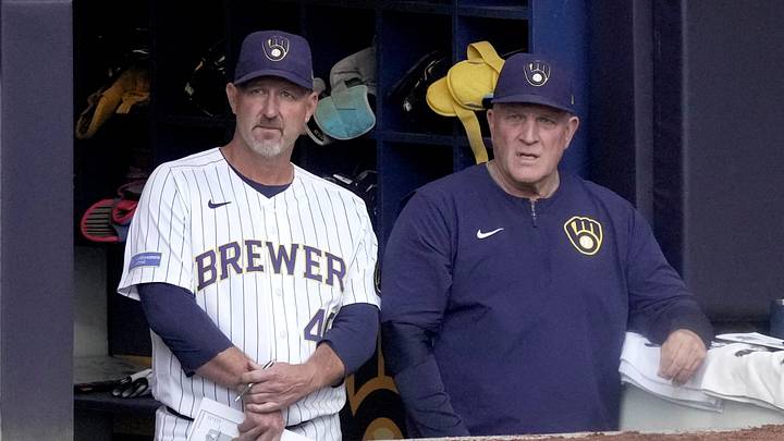 Milwaukee Brewers offense and strategy coordinator Jason Lane and manager Pat Murphy (49) talk during the second inning of their game against the St. Louis Cardinals Sunday, September 27, 2026 at American Family Field in Milwaukee, Wisconsin.