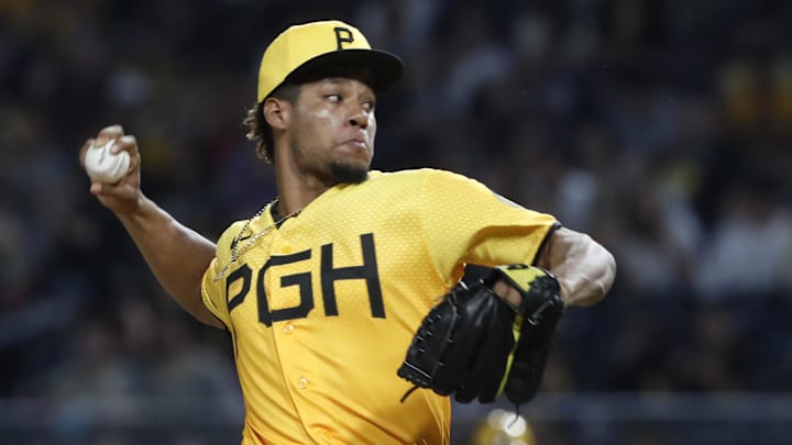 Jun 30, 2023; Pittsburgh, Pennsylvania, USA; Pittsburgh Pirates relief pitcher Dauri Moreta (36) pitches against the Milwaukee Brewers during the seventh inning at PNC Park. Mandatory Credit: Charles LeClaire-Imagn Images