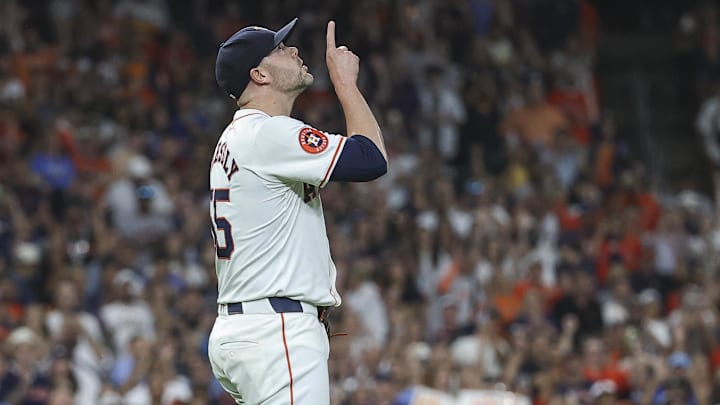 Aug 31, 2024; Houston, Texas, USA; Houston Astros relief pitcher Ryan Pressly (55) reacts after the final out during the ninth inning against the Kansas City Royals at Minute Maid Park.