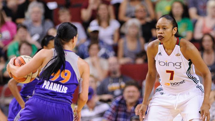 Aug 16, 2012; Seattle, WA, USA; Seattle Storm forward Tina Thompson (7) guards Phoenix Mercury guard Samantha Prahalis (99) during the 1st half at KeyArena. Seattle defeated Phoenix 72-58. Mandatory Credit: Steven Bisig-Imagn Images