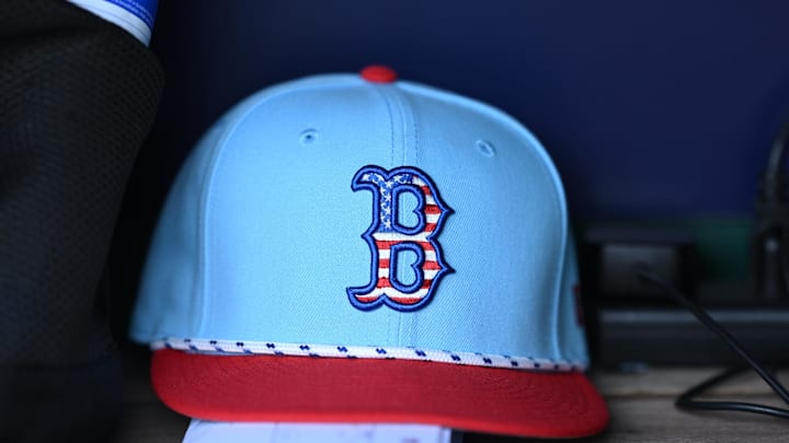 Jul 4, 2025; Washington, District of Columbia, USA; A 4th of July themed Boston Red Sox cap rests in the dugout during a game against the Washington Nationals at Nationals Park. Mandatory Credit: Rafael Suanes-Imagn Images
