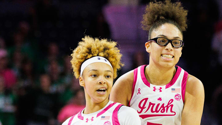 Notre Dame guard Hannah Hidalgo (3) and guard Olivia Miles (5) celebrate a three point shot made by Hidalgo during a NCAA women's basketball game between No. 3 Notre Dame and No. 21 California at Purcell Pavilion on Sunday, Feb. 9, 2025, in South Bend.