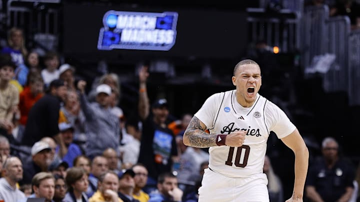 Texas A&M Aggies guard CJ Wilcher (10) reacts against the Michigan Wolverines during the first half in the second round of the NCAA Tournament  at Ball Arena.