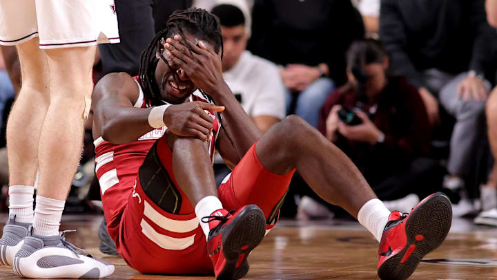 Jan 11, 2025; College Station, Texas, USA; Alabama Crimson Tide center Clifford Omoruyi (11) sits on the court after sustaining an injury against the Texas A&M Aggies during the first half at Reed Arena. Mandatory Credit: Erik Williams-Imagn Images Jan 11, 2025; College Station, Texas, USA; Alabama Crimson Tide center Clifford Omoruyi (11) sits on the court after sustaining an injury against the Texas A&M Aggies during the first half at Reed Arena. Mandatory Credit: Erik Williams-Imagn Images
