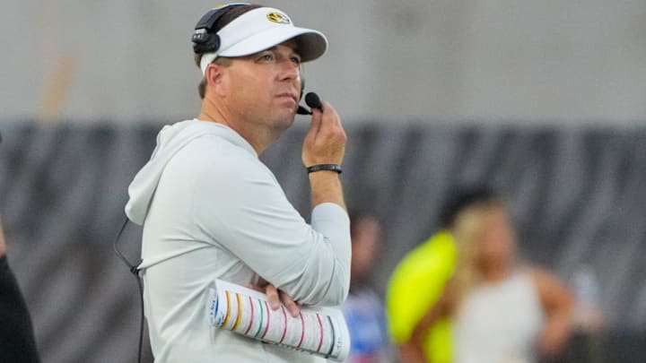 Sep 20, 2025; Columbia, Missouri, USA; Missouri Tigers head coach Eli Drinkwitz on field against the South Carolina Gamecocks during the first half of the game at Faurot Field at Memorial Stadium. Mandatory Credit: Denny Medley-Imagn Images