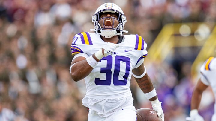 Linebacker Greg Penn III 30 celebrates after an interception as the LSU Tigers take on Texas A&M in Tiger Stadium in Baton Rouge, Louisiana, November 25, 2023.