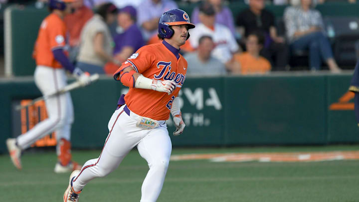 Clemson graduate Tristan Bissetta (27) rounnds first base during the bottom of the sixth inning at Doug Kingsmore Stadum in Clemson, S.C. Friday, March 14, 2025.