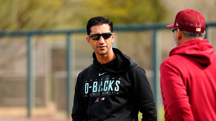 Arizona Diamondbacks general manager Mike Hazen talks to manager Torey Lovullo during spring training workouts at Salt River Fields in Scottsdale on Feb. 17, 2023.

Mlb Diamondbacks Workouts