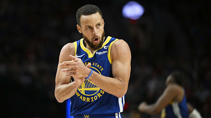 Golden State Warriors guard Stephen Curry (30) claps his hands in celebration during the second half against the Portland Trail Blazers at Moda Center. Mandatory Credit: Troy Wayrynen-Imagn Images