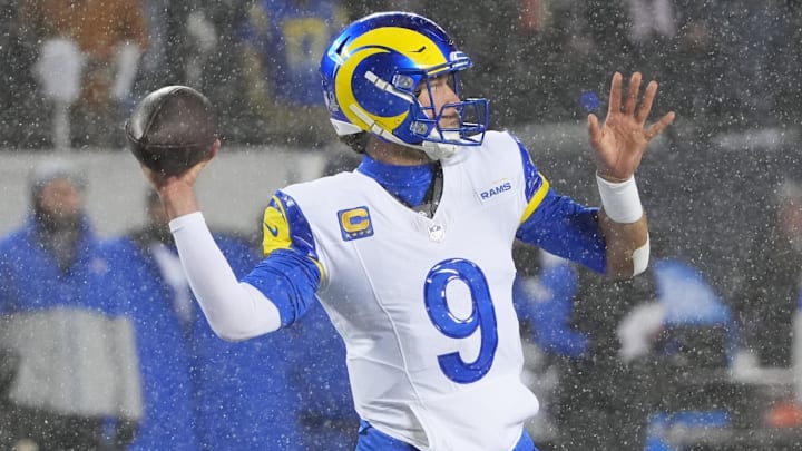 Jan 18, 2026; Chicago, IL, USA; Los Angeles Rams quarterback Matthew Stafford (9) throws a pass against the Chicago Bears during the second quarter of an NFC Divisional Round game at Soldier Field. Mandatory Credit: David Banks-Imagn Images