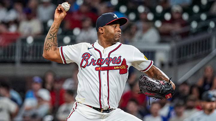 Aug 4, 2026; Cumberland, Georgia, USA; Atlanta Braves pitcher Raisel Iglesias (26)  pitches against the Miami Marlins during the ninth inning at Truist Park. Mandatory Credit: Dale Zanine-Imagn Images