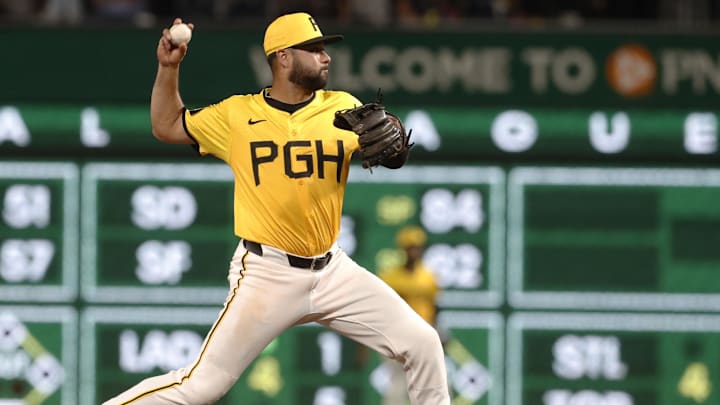 Pittsburgh Pirates shortstop Isiah Kiner-Falefa (7) throws to first base after a force out at second base against the Kansas City Royals during the sixth inning at PNC Park. 