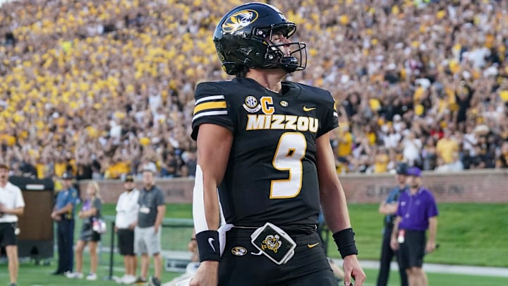 Aug 28, 2025; Columbia, Missouri, USA; Missouri Tigers quarterback Beau Pribula (9) celebrates after scoring against the Central Arkansas Bears during the first half of the game at Faurot Field at Memorial Stadium. Mandatory Credit: Denny Medley-Imagn Images