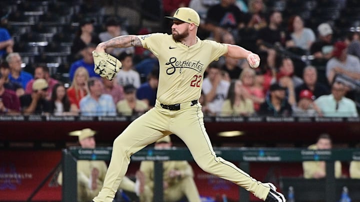 May 14, 2024; Phoenix, Arizona, USA;  Arizona Diamondbacks pitcher Logan Allen (22) pitches in the sixth inning against the Cincinnati Reds at Chase Field. Mandatory Credit: Matt Kartozian-USA TODAY Sports