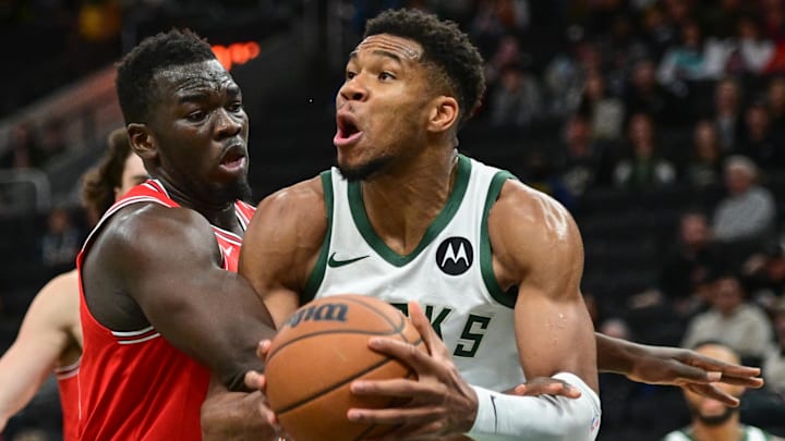 Oct 14, 2024; Milwaukee, Wisconsin, USA;  Milwaukee Bucks forward Giannis Antetokounmpo (34) looks for a shot against Chicago Bulls forward Adama Sanogo (21) in the third quarter at Fiserv Forum. Mandatory Credit: Benny Sieu-Imagn Images