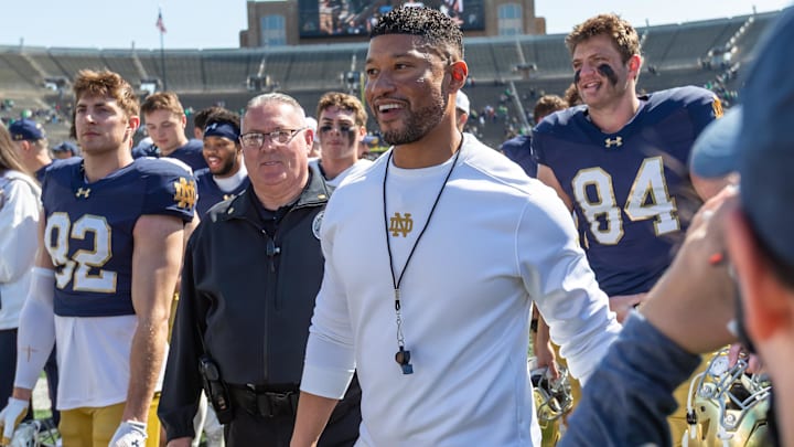 Apr 12, 2025; Notre Dame, IN, USA; Notre Dame Fighting Irish head coach Marcus Freeman smiles as he walks off the field after the Blue-Gold game at Notre Dame Stadium. Mandatory Credit: Michael Caterina-Imagn Images