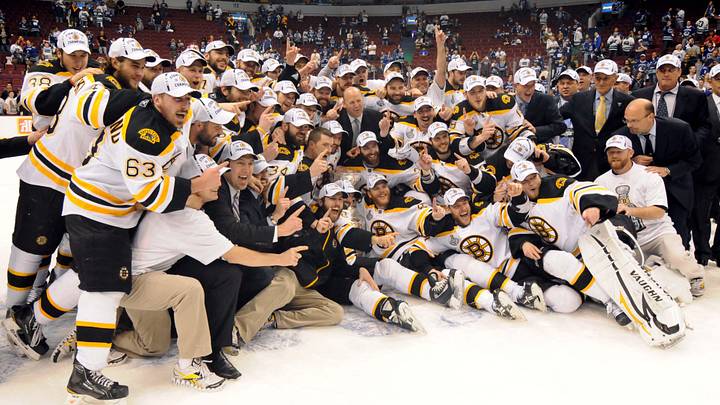 June 15, 2011; Vancouver, BC, CANADA; Boston Bruins players and coaches pose for a group photo after defeating the Vancouver Canucks 4-0 in game seven of the 2011 Stanley Cup Finals at Rogers Arena. Mandatory Credit: Anne-Marie Sorvin-Imagn Images June 15, 2011; Vancouver, BC, CANADA; Boston Bruins players and coaches pose for a group photo after defeating the Vancouver Canucks 4-0 in game seven of the 2011 Stanley Cup Finals at Rogers Arena. Mandatory Credit: Anne-Marie Sorvin-Imagn Images