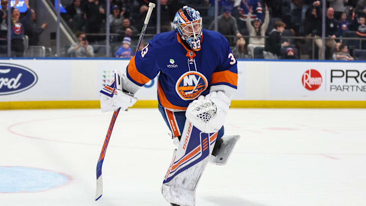 Dec 27, 2025; Elmont, New York, USA;  New York Islanders goaltender David Rittich (33) skates away from the net after making save on penalty shot on goal attempt in the third period against the New York Rangers at UBS Arena. Mandatory Credit: Wendell Cruz-Imagn Images