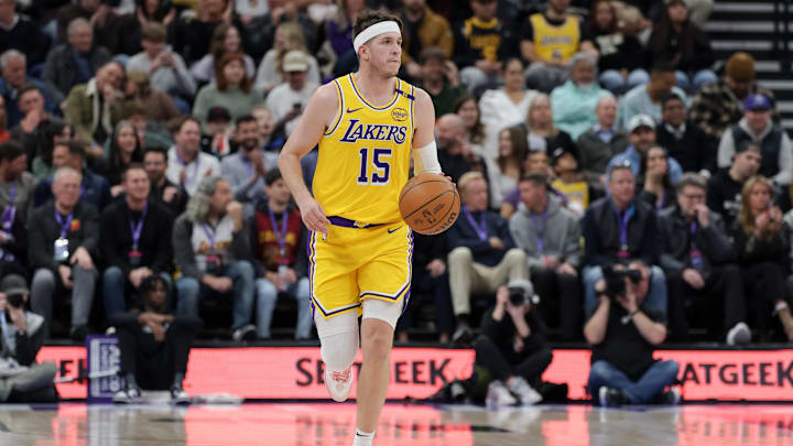 Feb 12, 2025; Salt Lake City, Utah, USA; Los Angeles Lakers guard Austin Reaves (15) dribbles against the Utah Jazz during the first quarter at Delta Center. Mandatory Credit: Chris Nicoll-Imagn Images