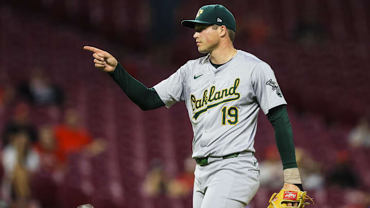 Aug 28, 2024; Cincinnati, Ohio, USA; Oakland Athletics relief pitcher Mason Miller (19) reacts after the victory over the Cincinnati Reds at Great American Ball Park. Mandatory Credit: Katie Stratman-Imagn Images Aug 28, 2024; Cincinnati, Ohio, USA; Oakland Athletics relief pitcher Mason Miller (19) reacts after the victory over the Cincinnati Reds at Great American Ball Park. Mandatory Credit: Katie Stratman-Imagn Images