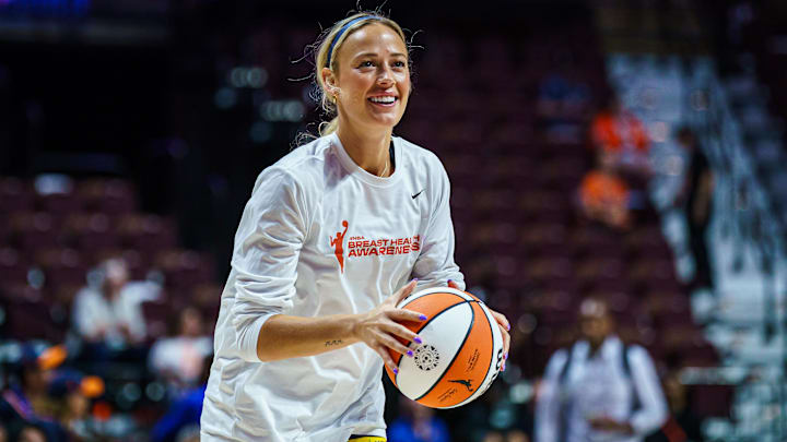 Aug 17, 2025; Uncasville, Connecticut, USA; Indiana Fever guard Sophie Cunningham (8) warms up before the start of the game against the Connecticut Sun at Mohegan Sun Arena. Mandatory Credit: David Butler II-Imagn Images