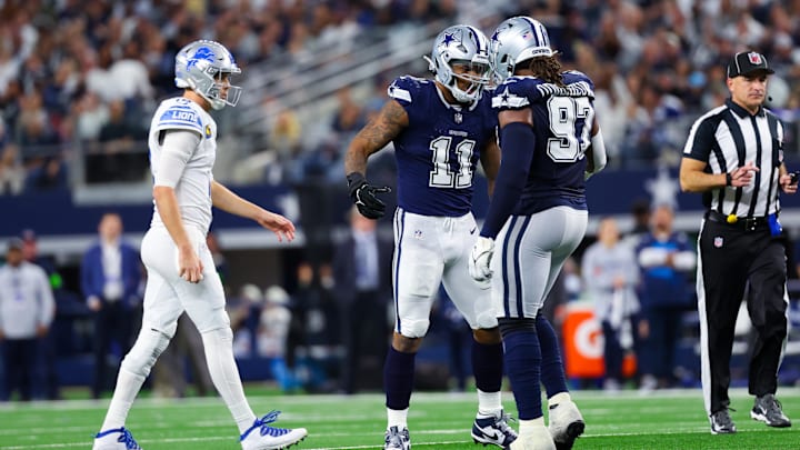 Dallas Cowboys linebacker Micah Parsons celebrates with Dallas Cowboys defensive tackle Osa Odighizuwa in front of Detroit Lions quarterback Jared Goff Dallas Cowboys linebacker Micah Parsons celebrates with Dallas Cowboys defensive tackle Osa Odighizuwa in front of Detroit Lions quarterback Jared Goff