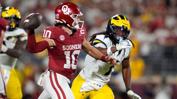 Oklahoma quarterback John Mateer rolls out in the Sooners' victory over Michigan.