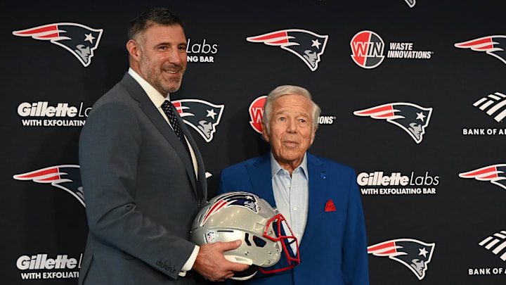 Jan 13, 2025; Foxborough, MA, USA; Mike Vrabel (left) poses for a photo with New England Patriots owner Robert Kraft (right) after a press conference at Gillette Stadium to introduce him as the Patriots new head coach. Mandatory Credit: Eric Canha-Imagn Images Jan 13, 2025; Foxborough, MA, USA; Mike Vrabel (left) poses for a photo with New England Patriots owner Robert Kraft (right) after a press conference at Gillette Stadium to introduce him as the Patriots new head coach. Mandatory Credit: Eric Canha-Imagn Images