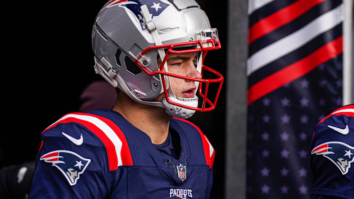 New England Patriots quarterback Drake Maye (10) walks to the field to warm up before the start of the game against the Buffalo Bills at Gillette Stadium. 