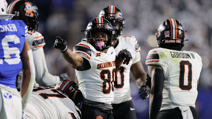 Oct 18, 2024; Provo, Utah, USA; Oklahoma State Cowboys wide receiver Brennan Presley (80) reacts to a first down against the Brigham Young Cougars during the fourth quarter at LaVell Edwards Stadium. Mandatory Credit: Rob Gray-Imagn Images