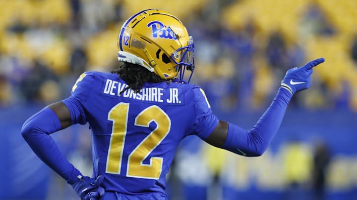 Nov 4, 2023; Pittsburgh, Pennsylvania, USA;  Pittsburgh Panthers defensive back M.J. Devonshire (12) gestures to the Florida State Seminoles bench during the fourth quarter at Acrisure Stadium. The Seminoles won 24-7. Mandatory Credit: Charles LeClaire-USA TODAY Sports
