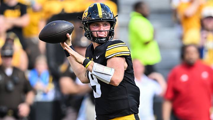 Sep 5, 2026; Iowa City, Iowa, USA;  Iowa Hawkeyes quarterback Hank Brown (9) throws a pass against the Northern Illinois Huskies during the first quarter at Kinnick Stadium.  Mandatory Credit: Jeffrey Becker-Imagn Images