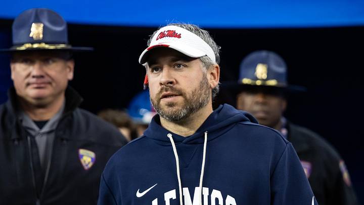 Jan 8, 2026; Glendale, AZ, USA; Mississippi Rebels head coach Pete Golding against the Miami Hurricanes during the 2026 Fiesta Bowl and semifinal game of the College Football Playoff at State Farm Stadium. Mandatory Credit: Mark J. Rebilas-Imagn Images Jan 8, 2026; Glendale, AZ, USA; Mississippi Rebels head coach Pete Golding against the Miami Hurricanes during the 2026 Fiesta Bowl and semifinal game of the College Football Playoff at State Farm Stadium. Mandatory Credit: Mark J. Rebilas-Imagn Images