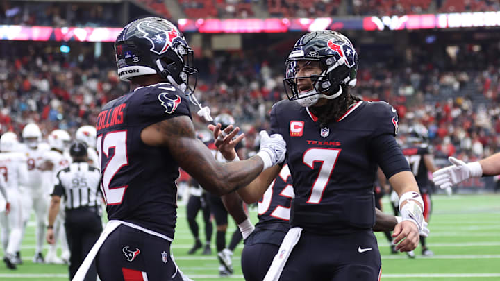 Dec 14, 2025; Houston, Texas, USA; Houston Texans wide receiver Nico Collins (12) and quarterback C.J. Stroud (7) celebrate a touchdown during the fourth quarter against the Arizona Cardinals at NRG Stadium. Mandatory Credit: Troy Taormina-Imagn Images