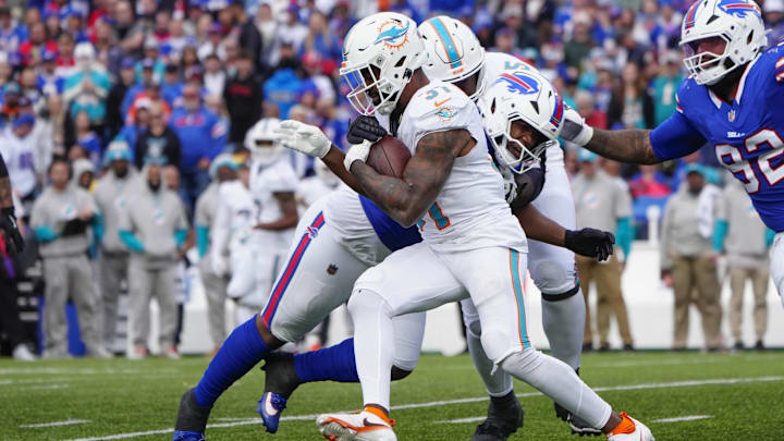 Miami Dolphins running back Raheem Mostert (31) runs with the ball against the Buffalo Bills during the second half at Highmark Stadium.