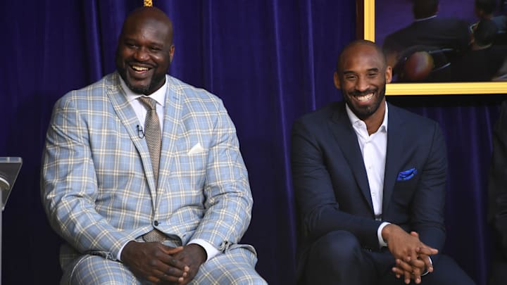 Mar 24, 2017; Los Angeles, CA, USA; Los Angeles Lakers former center Shaquille O'Neal (left) and guard Kobe Bryant react during ceremony to unveil statue of O'Neal at Staples Center. Mandatory Credit: Kirby Lee-Imagn Images Mar 24, 2017; Los Angeles, CA, USA; Los Angeles Lakers former center Shaquille O'Neal (left) and guard Kobe Bryant react during ceremony to unveil statue of O'Neal at Staples Center. Mandatory Credit: Kirby Lee-Imagn Images
