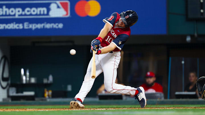 Jul 13, 2024; Arlington, TX, USA;  American League Future catcher Kyle Teel (10) hits a double during the fifth inning against the American League Future team during the Major league All-Star Futures game at Globe Life Field.