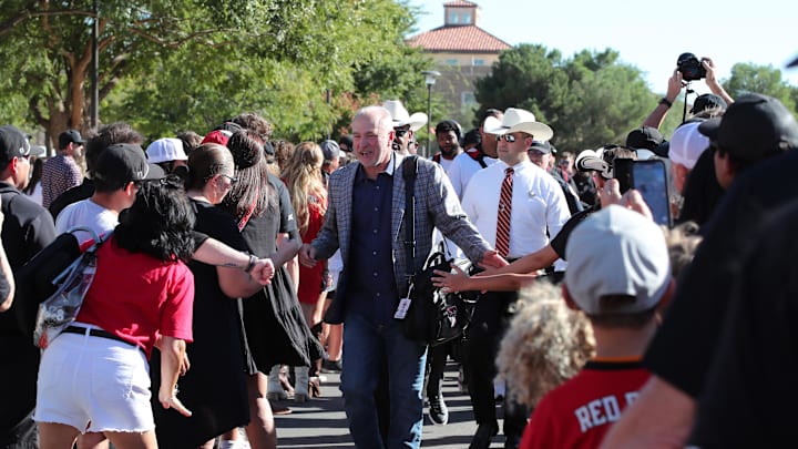 Sep 28, 2024; Lubbock, Texas, USA;  Texas Tech Red Raiders head coach Joey McGuire greets fans before the game between the Cincinnati Bearcats and the Texas Tech Red Raiders at Jones AT&T Stadium and Cody Campbell Field. Mandatory Credit: Michael C. Johnson-Imagn Images