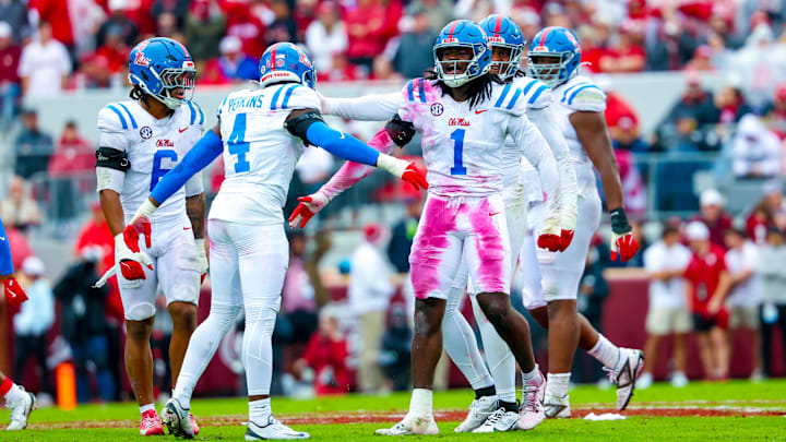 Oct 25, 2025; Norman, Oklahoma, USA;  Ole Miss Rebels defensive end Princewill Umanmielen (1) celebrates with Ole Miss Rebels linebacker Suntarine Perkins (4) during the first half at Gaylord Family-Oklahoma Memorial Stadium. Mandatory Credit: Kevin Jairaj-Imagn Images