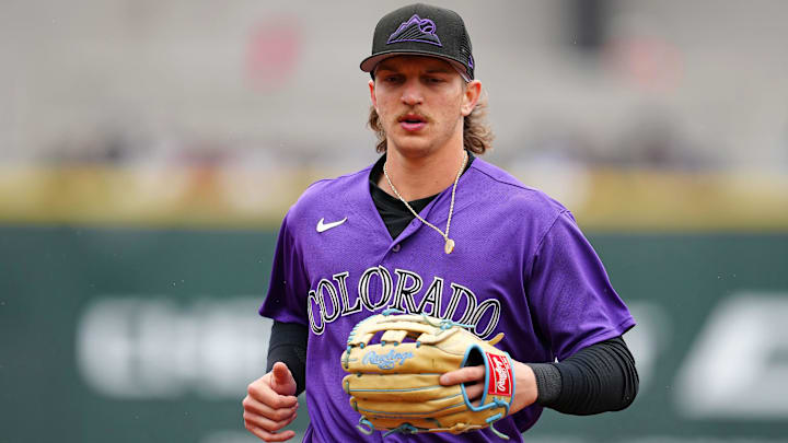 Mar 19, 2023; Summerlin, Nevada, USA; Colorado Rockies right fielder Zac Veen (73) returns to the dugout in a game against the Kansas City Royals at the end of the third inning at Las Vegas Ballpark. Mandatory Credit: Stephen R. Sylvanie-Imagn Images