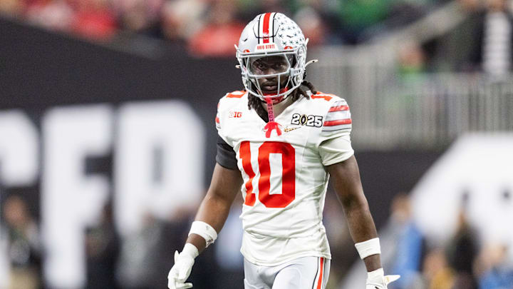 Jan 20, 2025; Atlanta, GA, USA; Ohio State Buckeyes cornerback Denzel Burke (10) against the Notre Dame Fighting Irish during the CFP National Championship college football game at Mercedes-Benz Stadium. Mandatory Credit: Mark J. Rebilas-Imagn Images
