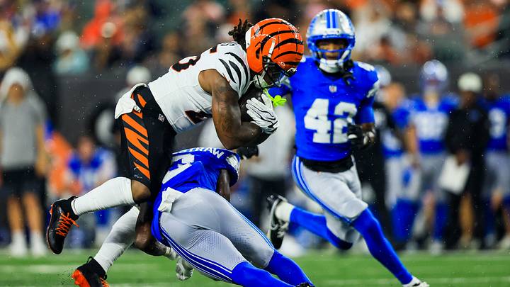 Aug 13, 2026; Cincinnati, Ohio, USA; Cincinnati Bengals running back Tahj Brooks (25) runs with the ball against Detroit Lions cornerback Ennis Rakestraw Jr. (2) in the first half at Paycor Stadium. Mandatory Credit: Katie Stratman-Imagn Images Aug 13, 2026; Cincinnati, Ohio, USA; Cincinnati Bengals running back Tahj Brooks (25) runs with the ball against Detroit Lions cornerback Ennis Rakestraw Jr. (2) in the first half at Paycor Stadium. Mandatory Credit: Katie Stratman-Imagn Images